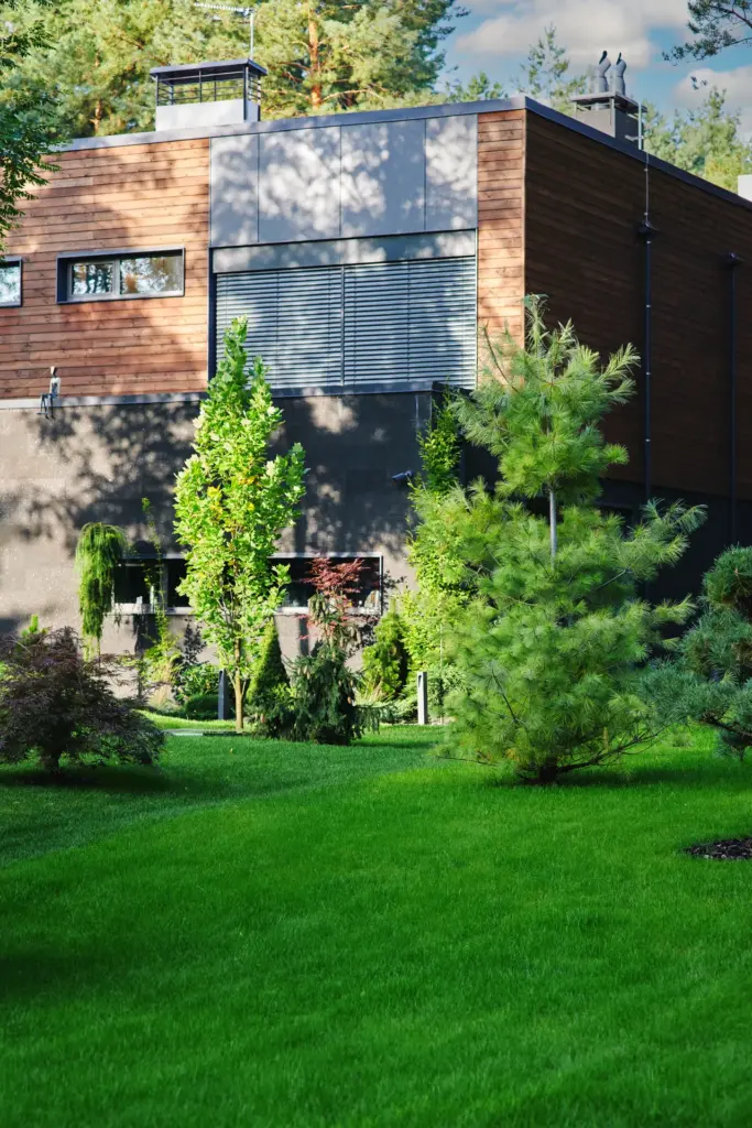 modern home with residential lawn services performed